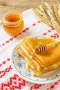 Stack of crepes with honey Royalty Free Stock Photo