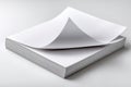 A Stack of Crisp, Blank Sheets of Paper with One Sheet Slightly Curled at the Top, Perfect for Creative Projects and Writing Royalty Free Stock Photo
