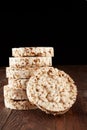 Stack of crispbreads on dark wooden table Royalty Free Stock Photo