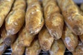 Stack of crispy baguettes at the bakery Royalty Free Stock Photo