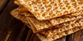 Stack of crispy matzo bread on a rustic wooden surface Royalty Free Stock Photo