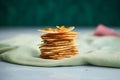 a stack of crispy papadums on cloth Royalty Free Stock Photo