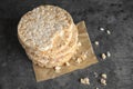 Stack of crunchy rice cakes on grey background. Royalty Free Stock Photo