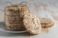 Stack of crunchy rice cakes on white wooden table. Food background Royalty Free Stock Photo