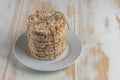 Stack of crunchy rice cakes on white wooden table. Food background Royalty Free Stock Photo