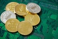 Stack of cryptocurrencies in a circle on motherboard. Cryptocurrency concept, close-up, selective focus