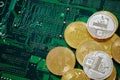 Stack of cryptocurrencies in a circle on motherboard. Cryptocurrency concept, close-up, selective focus