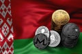 Stack of Cryptocurrencies coins on Belarusian flag. Situation of Bitcoin and other cryptocurrencies in Belarus Royalty Free Stock Photo