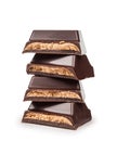 Stack of dark chocolate pieces with filling Royalty Free Stock Photo