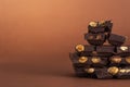 Stack of dark chocolate pieces with roasted almonds Royalty Free Stock Photo
