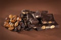 Stack of dark chocolate pieces with roasted almonds and raisins Royalty Free Stock Photo