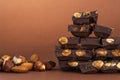 Stack of dark chocolate pieces with roasted almonds Royalty Free Stock Photo