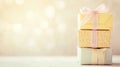 Stack of Decorative Gift Boxes Wrapped With Ribbon and a Bow, Set on a Light Surface Royalty Free Stock Photo