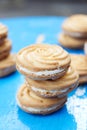 Stack of delicious biscuits with cream