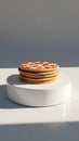 Stack of Delicious Cookies on White Pedestal Display Royalty Free Stock Photo