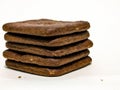 Stack of delicious homemade chocolate crackers on a white surface Royalty Free Stock Photo