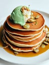 Delicious pancakes on plate with maple syrup and ice cream topping Royalty Free Stock Photo