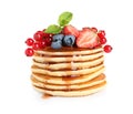 Stack of delicious pancakes with fresh berries and syrup on background Royalty Free Stock Photo