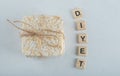 Stack of delicious puffed crispbread tied with rope and wooden letters