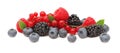Stack of different berries with green leaves (isolated)