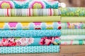 Stack of different colorful fabric rolls Royalty Free Stock Photo