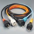 A stack of different colours electricity cables - orange, black, blue, white, European