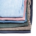 Stack of different jeans and corduroys close up Royalty Free Stock Photo