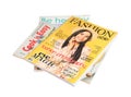 Stack of different magazines on white Royalty Free Stock Photo