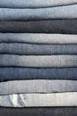 Stack of different old worn blue jeans Royalty Free Stock Photo