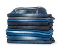 Stack of different shades of blue jeans