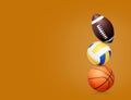 Stack of different sport balls on dark orange background, space for text