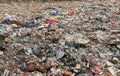 Stack of different types of large garbage dump, plastic bags, and trash bins in urban area in Environmental pollution concept