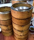 Stack of Dim Sum bamboo Container for steaming Asian, Japanese, Chinese Vietnamese and Thai Food.Isolated. Royalty Free Stock Photo