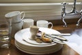 Stack Of Dirty Dishes And Silverware By Sink Royalty Free Stock Photo