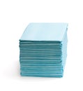 Stack of disposable bed pads isolated on white