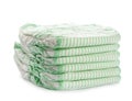 Stack of disposable diapers on white. Baby accessories Royalty Free Stock Photo