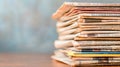 A stack of diverse vintage newspapers overlapping each displaying different headlines and imagery evoking a sense of history Royalty Free Stock Photo