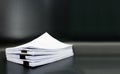 Stack documents or files on black background. Royalty Free Stock Photo