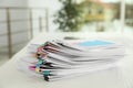 Stack of documents with paper clips on office table Royalty Free Stock Photo