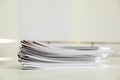 Stack of documents with paper clips on office table. Royalty Free Stock Photo