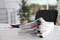 Stack of documents with paper clips on office table. Royalty Free Stock Photo