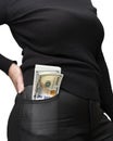 A stack of 100 dollars bills sticking out of the front pocket of women`s jeans. Money in your pocket, business Royalty Free Stock Photo