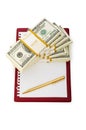 Stack of dollars and blank pad Royalty Free Stock Photo