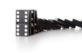 Stack of dominoes falling Royalty Free Stock Photo