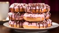 A stack of doughnuts with chocolate pink color background