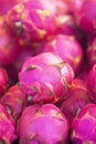 Stack of dragon fruits on a market stall Royalty Free Stock Photo
