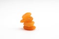 Stack of Dried apricots fruits isolated on a white background Royalty Free Stock Photo
