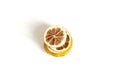 Stack of dried lemon slices on white background