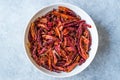 Stack of Dried Red Chili or Chilli Cayenne Pepper in Bowl Royalty Free Stock Photo