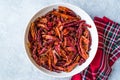 Stack of Dried Red Chili or Chilli Cayenne Pepper in Bowl Royalty Free Stock Photo